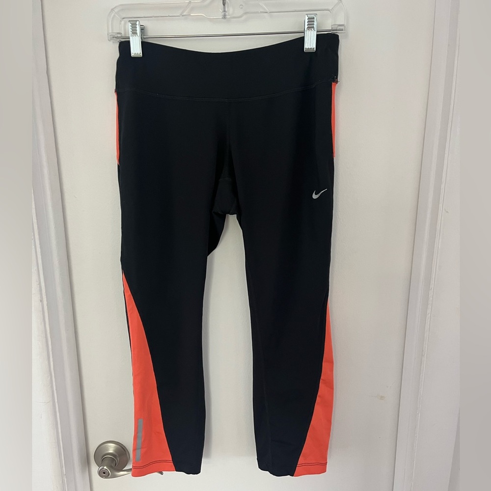 Black & orange Nike running leggings